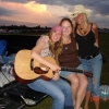 a break from the mud wrestling w/ bridget and amy at country fever fest; photo by sharon and john champlin